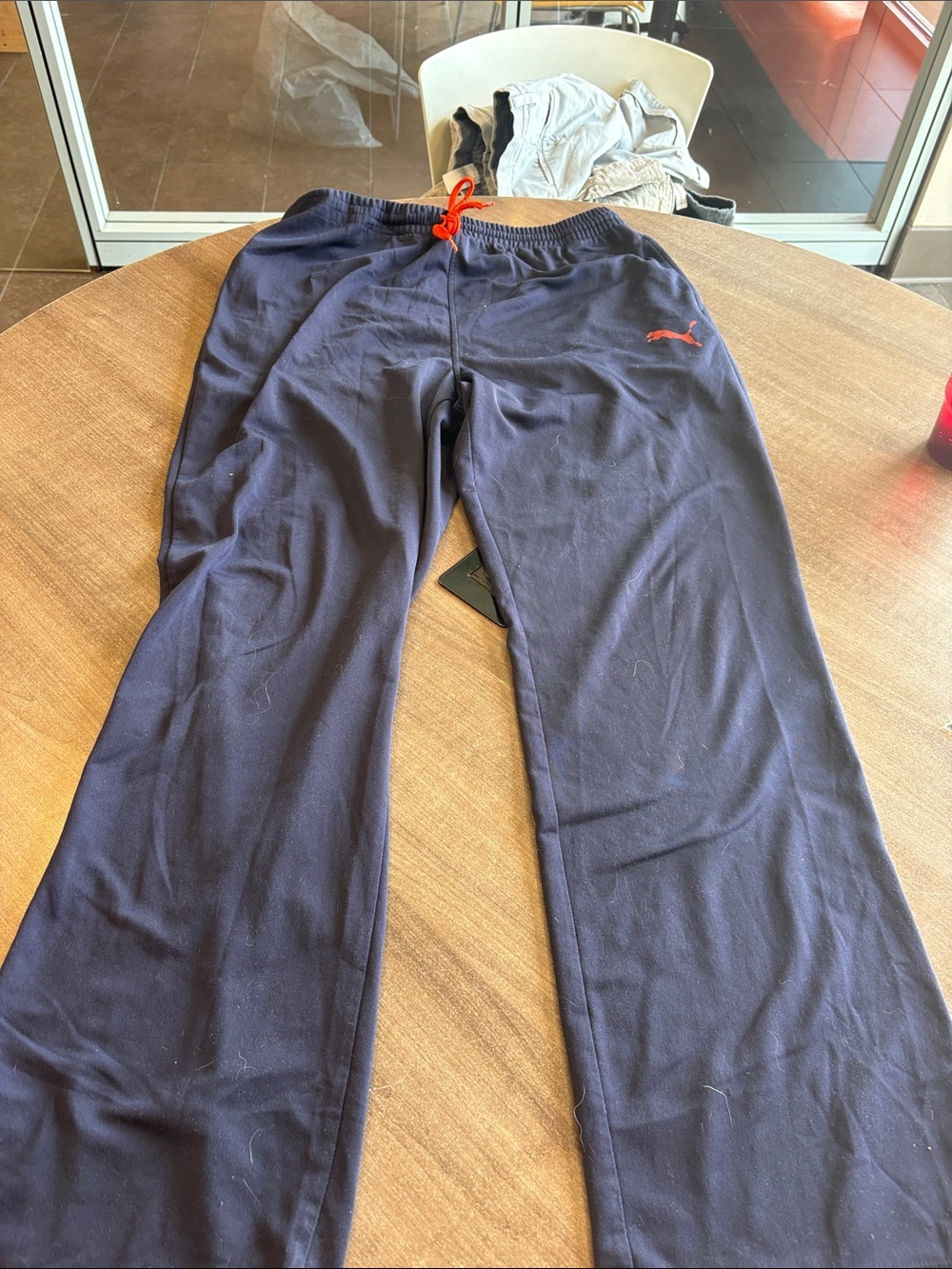 Puma Navy Sweatpants with Red Drawstring and Logo